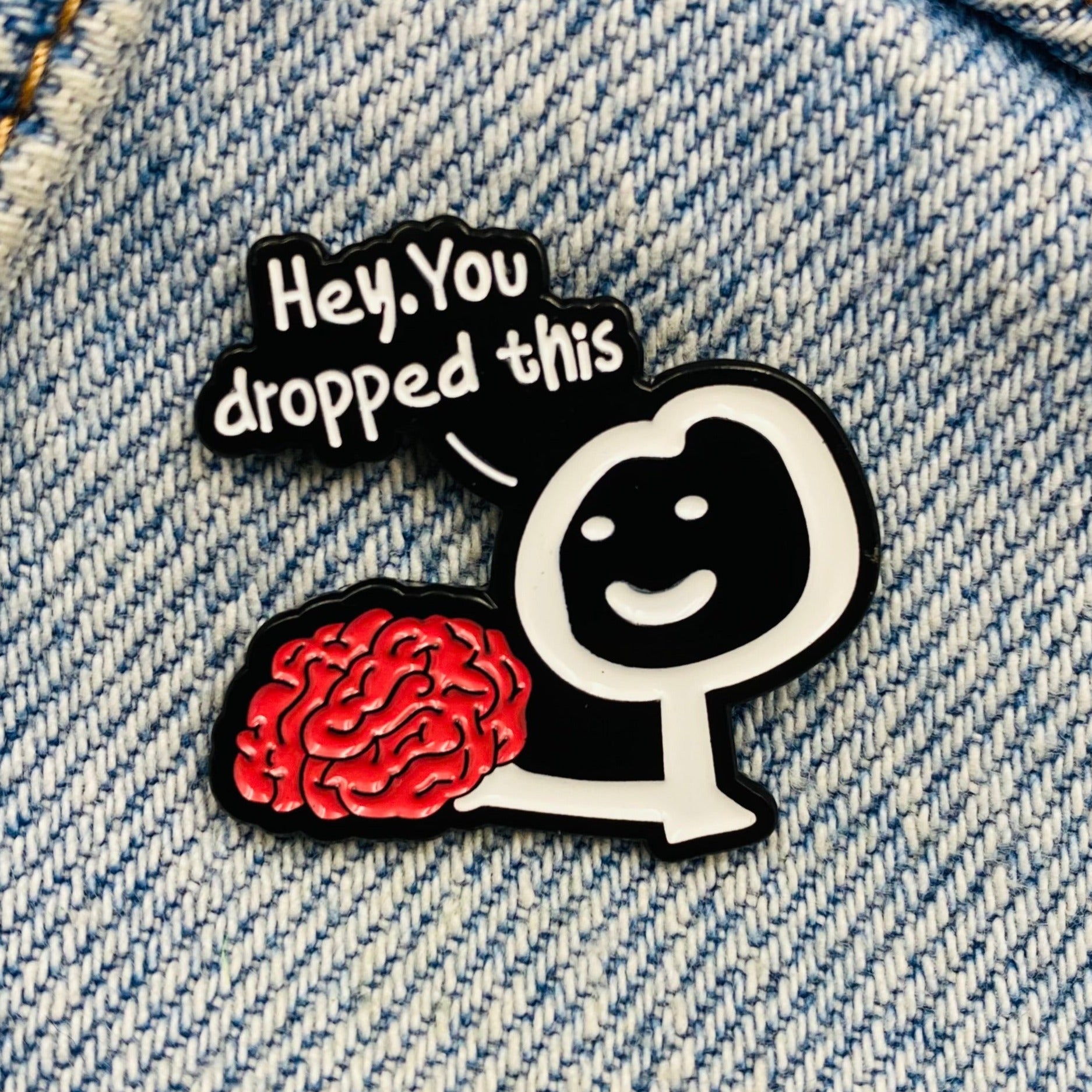 Saying You dropped your brain Enamel Pin