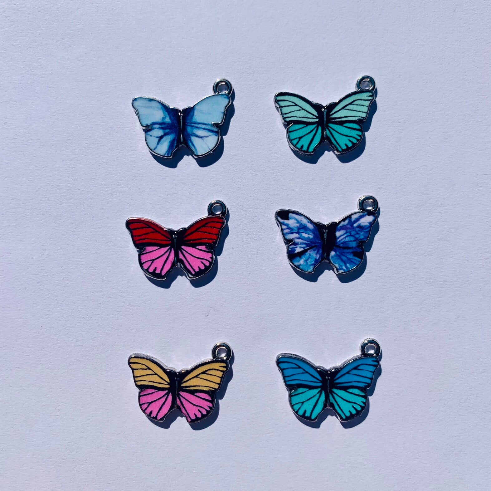 Sechs Schmetterling Charms