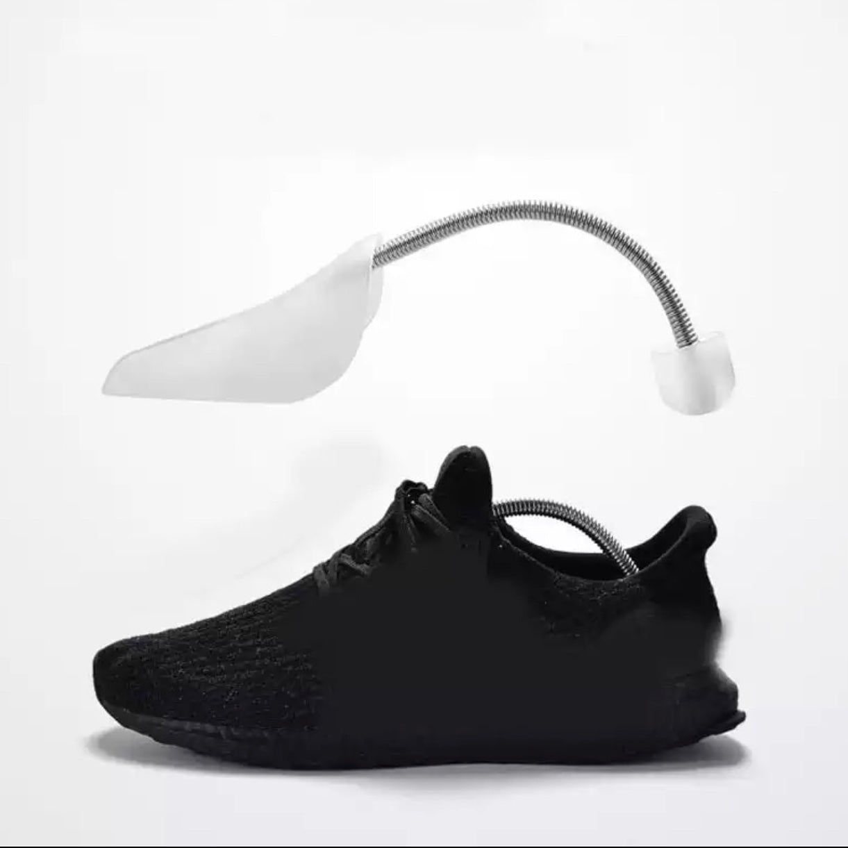 Shoe tree made of stable and durable plastic with spiral spring