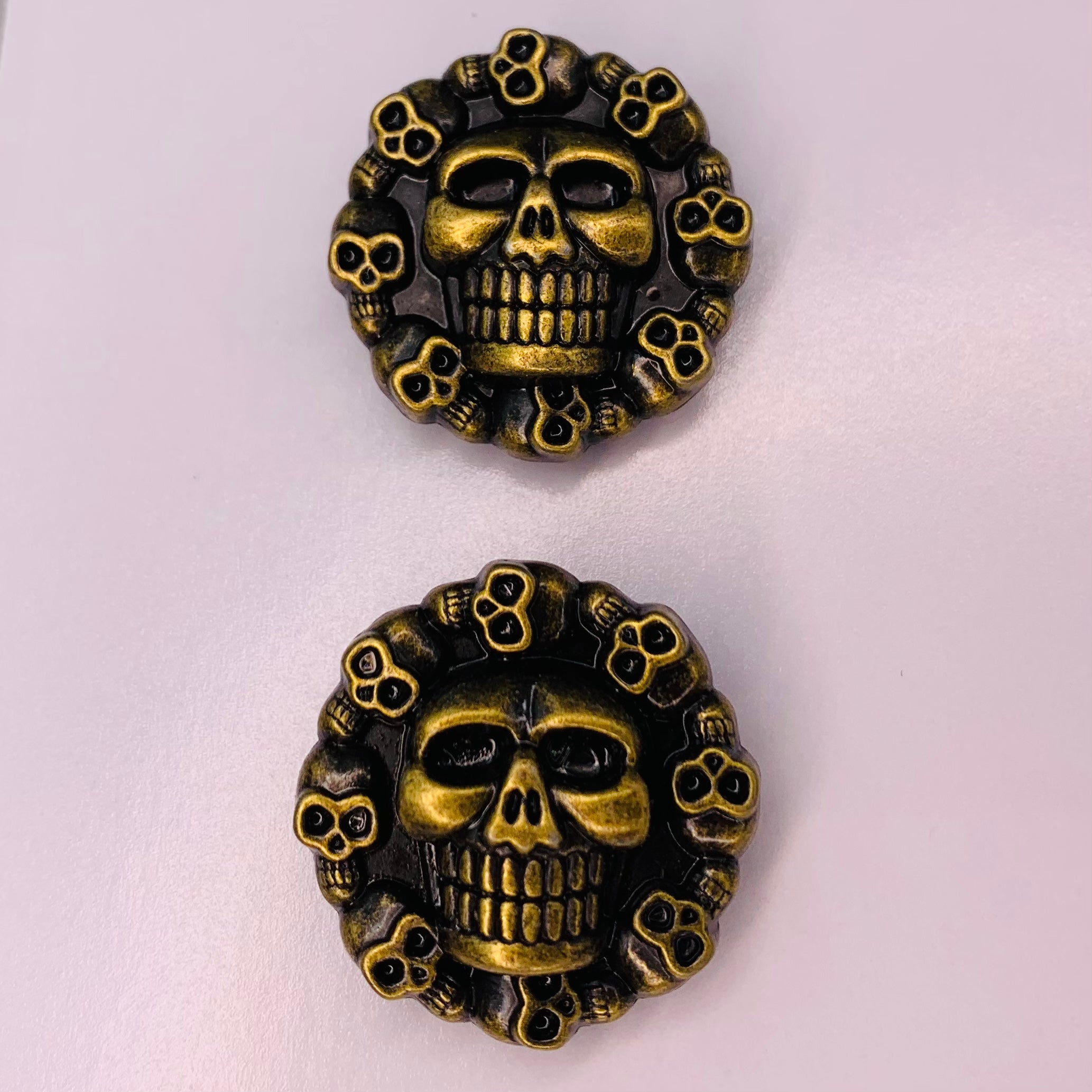 Golden skull lace locks