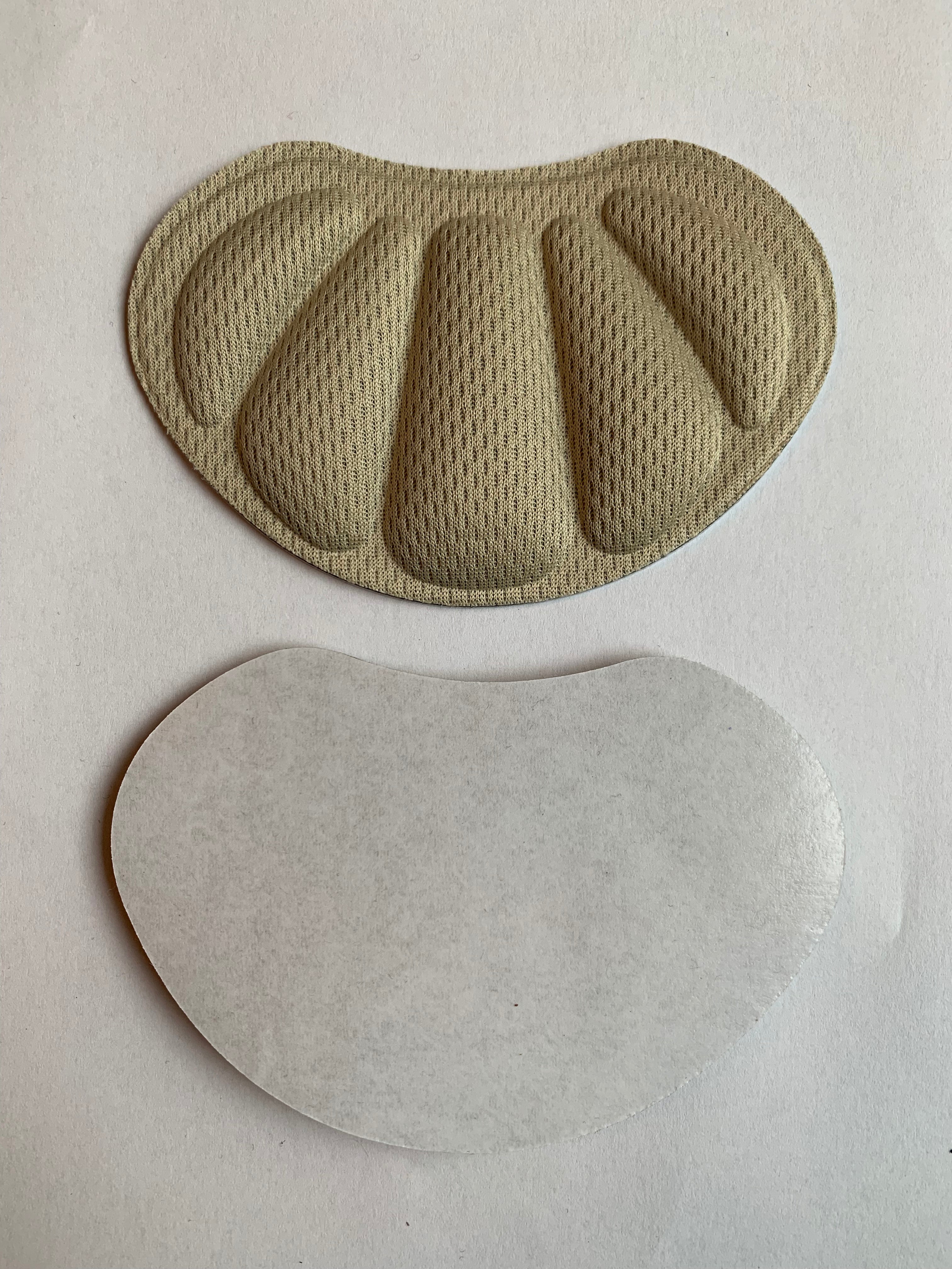 Soft insert pads with adhesive backing anti-friction