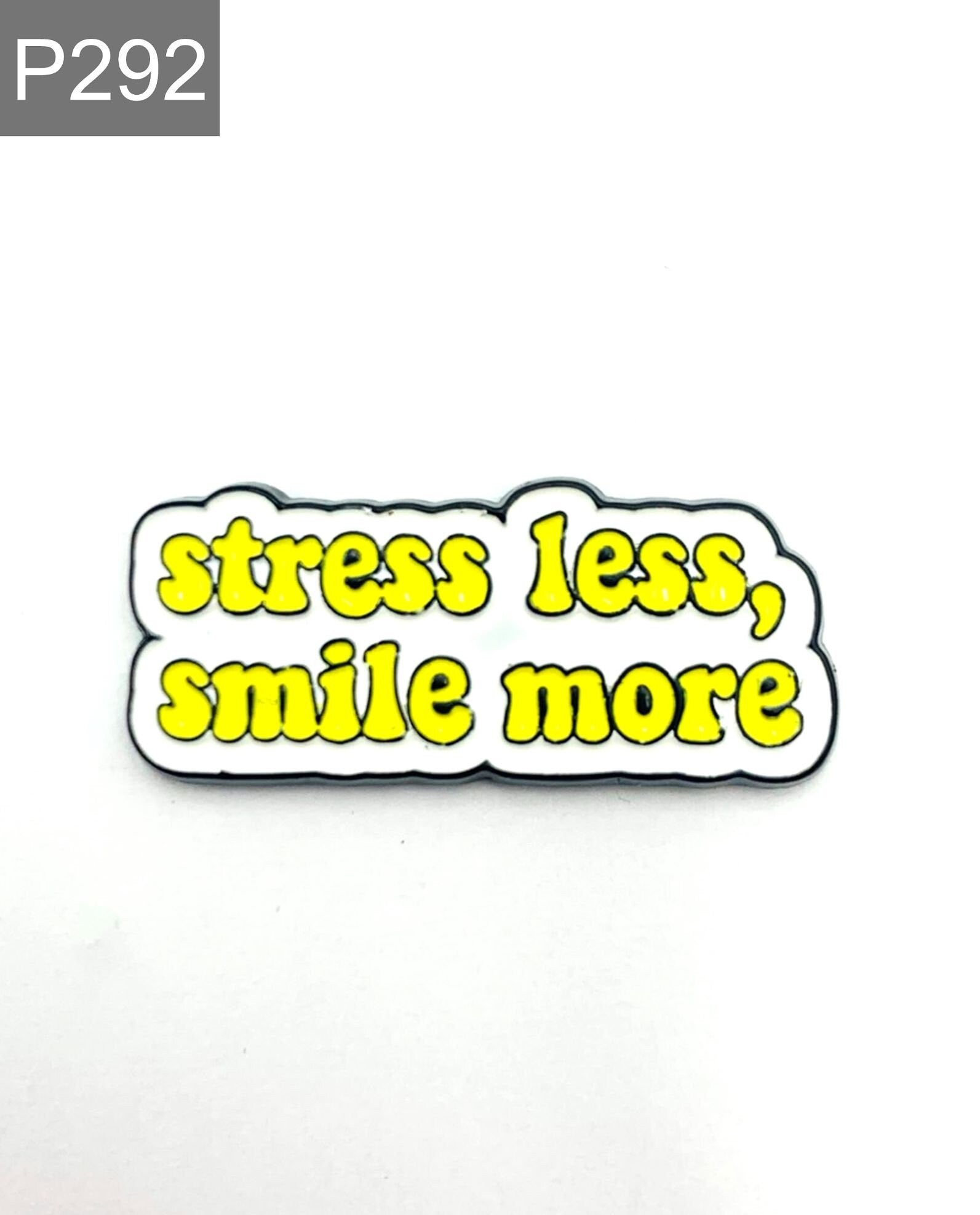 Saying "stress less, smile more" Enamel Pin